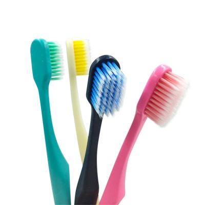 Wholesale custom family protect gums pla corn starch plastic adult toothbrush with logo